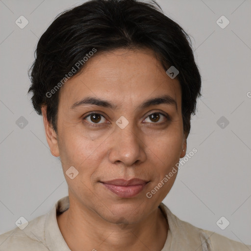 Joyful white adult female with short  brown hair and brown eyes