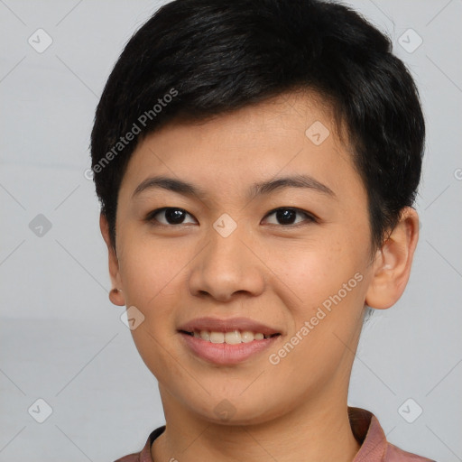 Joyful asian young-adult female with short  brown hair and brown eyes