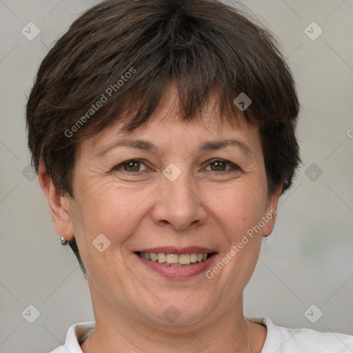 Joyful white adult female with short  brown hair and brown eyes