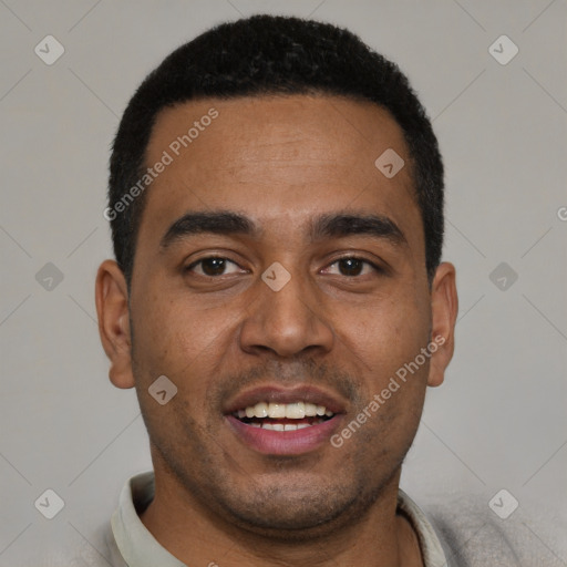 Joyful black young-adult male with short  black hair and brown eyes