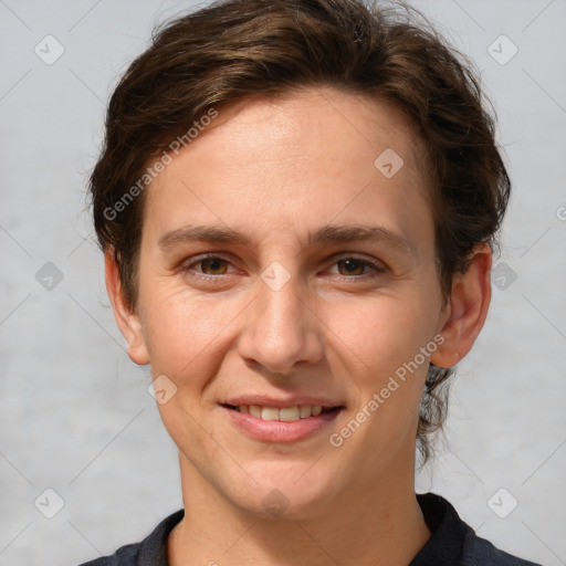 Joyful white young-adult female with short  brown hair and brown eyes