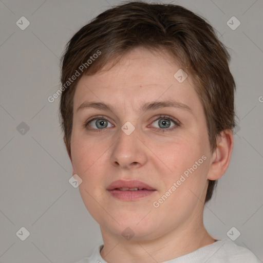 Joyful white young-adult female with short  brown hair and grey eyes