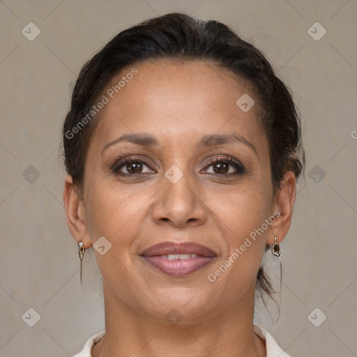 Joyful white adult female with medium  brown hair and brown eyes