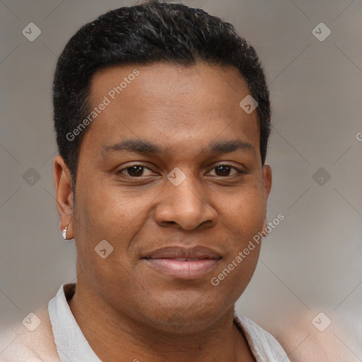 Joyful black young-adult male with short  brown hair and brown eyes