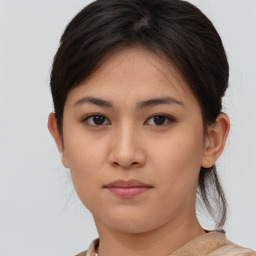 Neutral asian young-adult female with medium  brown hair and brown eyes