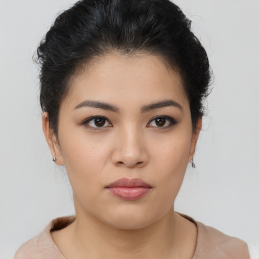 Neutral asian young-adult female with short  brown hair and brown eyes
