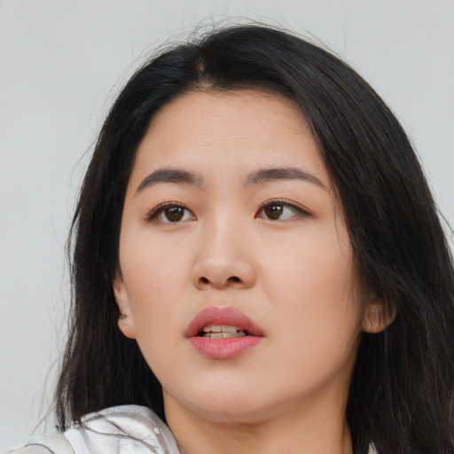 Neutral asian young-adult female with long  black hair and brown eyes