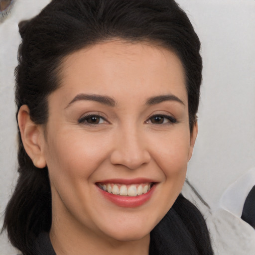 Joyful white young-adult female with medium  brown hair and brown eyes