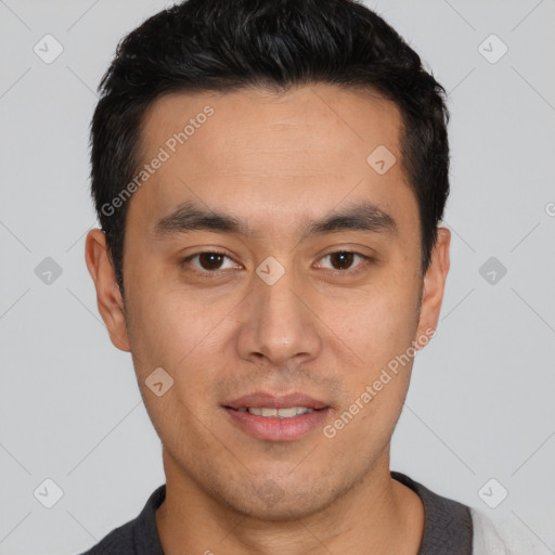 Joyful white young-adult male with short  black hair and brown eyes