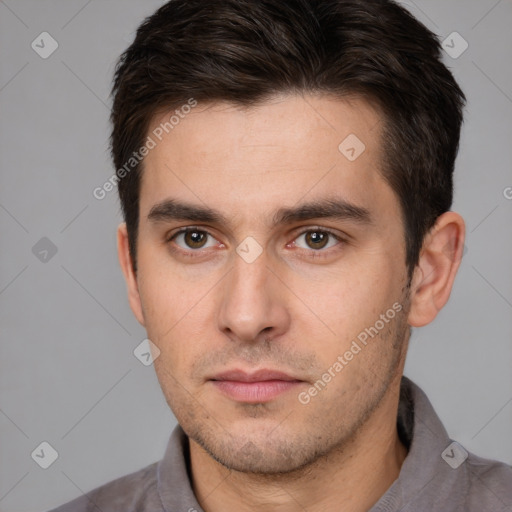 Neutral white young-adult male with short  brown hair and brown eyes