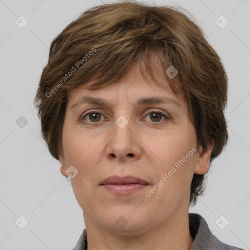 Joyful white adult female with short  brown hair and brown eyes