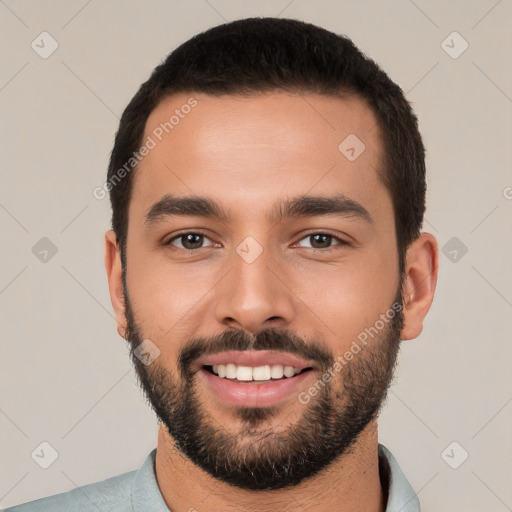 Joyful white young-adult male with short  black hair and brown eyes