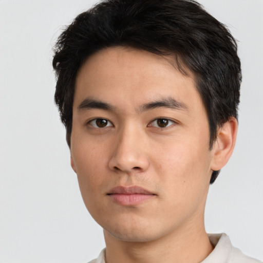 Neutral asian young-adult male with short  brown hair and brown eyes