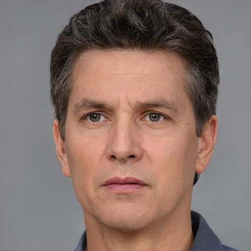 Neutral white adult male with short  brown hair and brown eyes