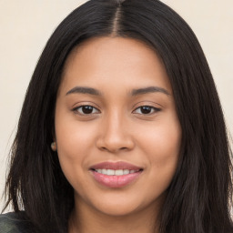 Joyful white young-adult female with long  black hair and brown eyes