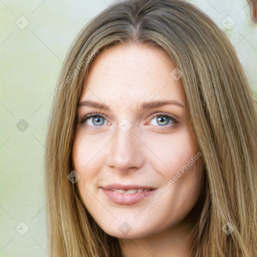 Joyful white young-adult female with long  brown hair and green eyes