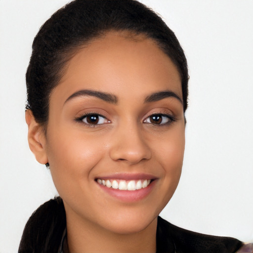 Joyful latino young-adult female with long  brown hair and brown eyes