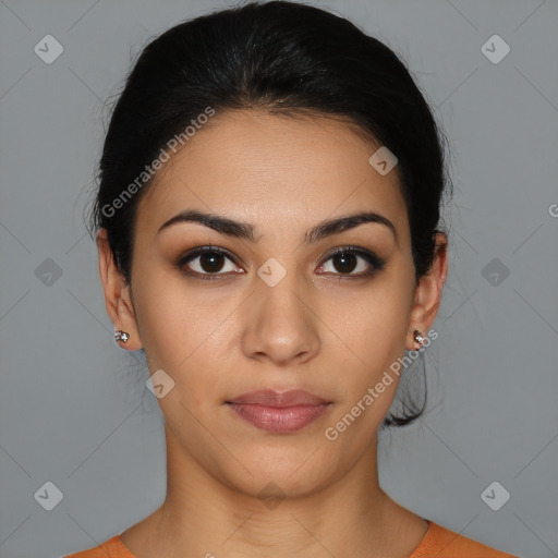 Joyful latino young-adult female with medium  brown hair and brown eyes