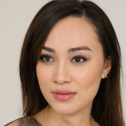 Neutral asian young-adult female with long  brown hair and brown eyes