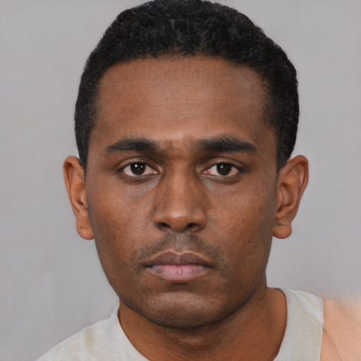 Neutral black young-adult male with short  black hair and brown eyes