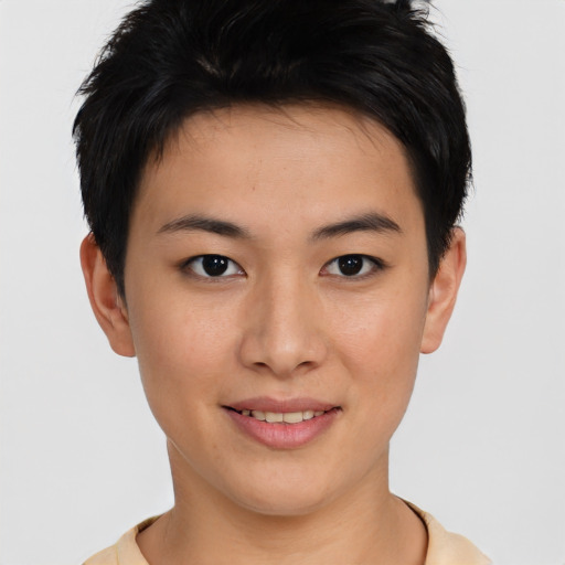 Joyful asian young-adult female with short  brown hair and brown eyes