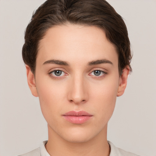 Neutral white young-adult female with short  brown hair and brown eyes