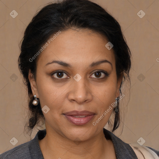 Joyful latino adult female with medium  brown hair and brown eyes