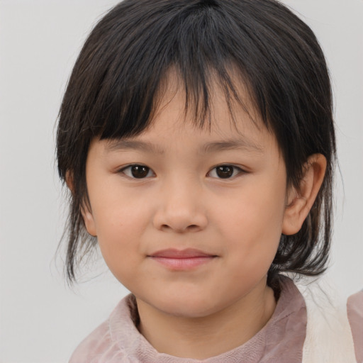 Joyful asian child female with medium  brown hair and brown eyes