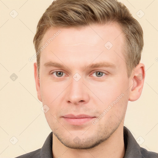 Neutral white young-adult male with short  brown hair and grey eyes