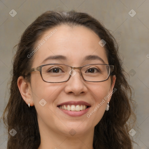 Joyful white adult female with long  brown hair and brown eyes