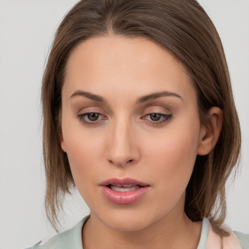 Neutral white young-adult female with medium  brown hair and brown eyes