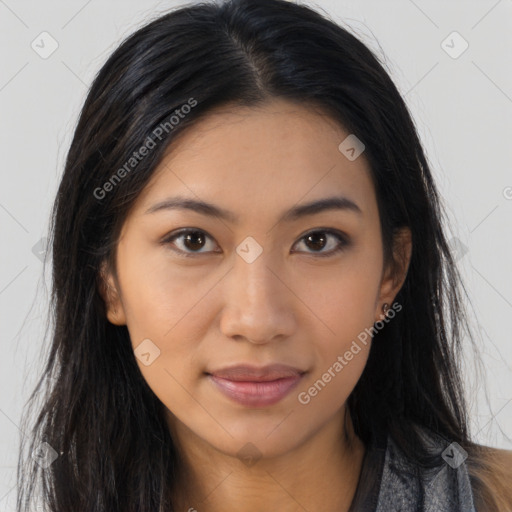 Joyful latino young-adult female with long  brown hair and brown eyes