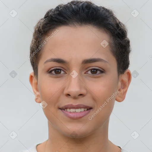 Joyful latino young-adult female with short  brown hair and brown eyes