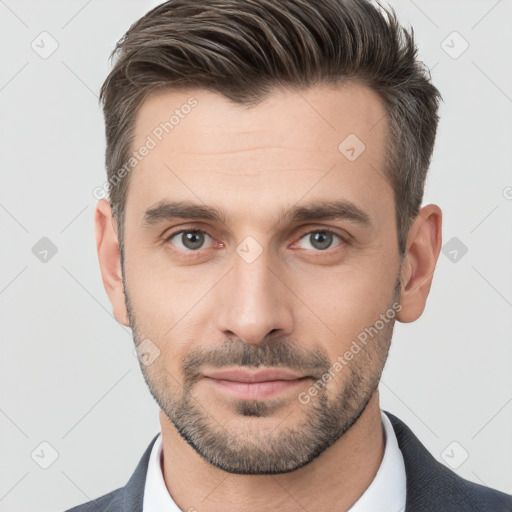 Neutral white young-adult male with short  brown hair and brown eyes