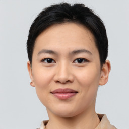 Joyful asian young-adult female with short  brown hair and brown eyes