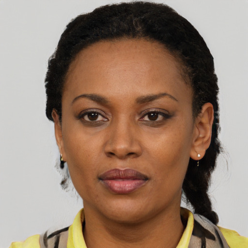 Neutral black adult female with short  black hair and brown eyes