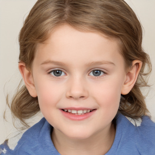 Joyful white child female with medium  brown hair and brown eyes