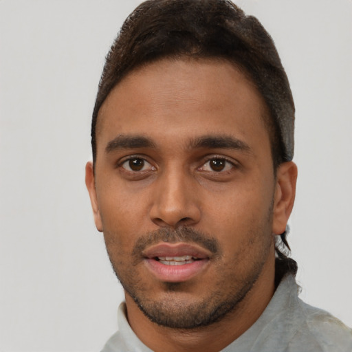 Neutral black young-adult male with short  black hair and brown eyes