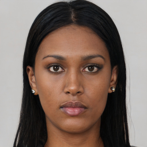 Neutral black young-adult female with long  black hair and brown eyes