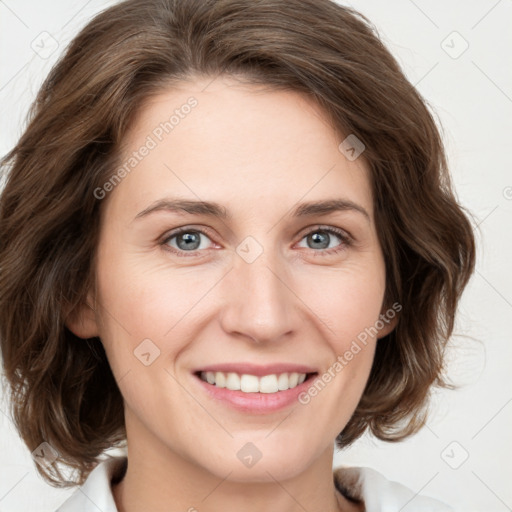 Joyful white young-adult female with medium  brown hair and green eyes