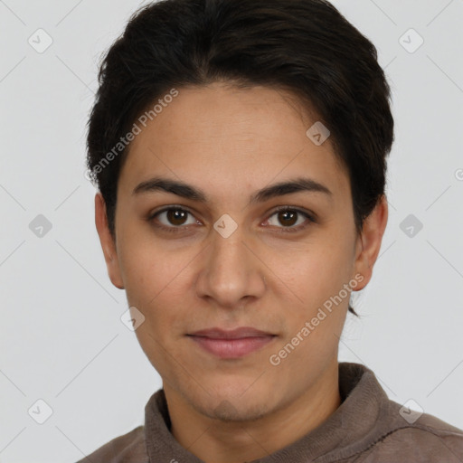 Joyful latino young-adult female with short  brown hair and brown eyes