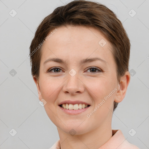 Joyful white young-adult female with short  brown hair and brown eyes