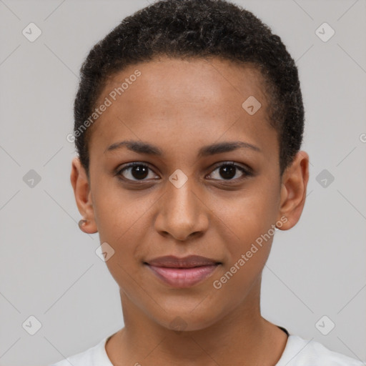 Joyful black young-adult female with short  brown hair and brown eyes