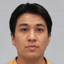 Neutral asian young-adult male with short  brown hair and brown eyes