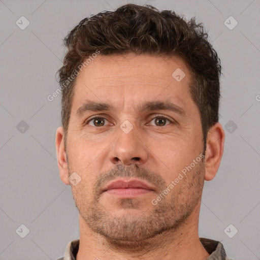 Neutral white adult male with short  brown hair and brown eyes