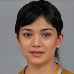 Joyful white young-adult female with short  black hair and brown eyes