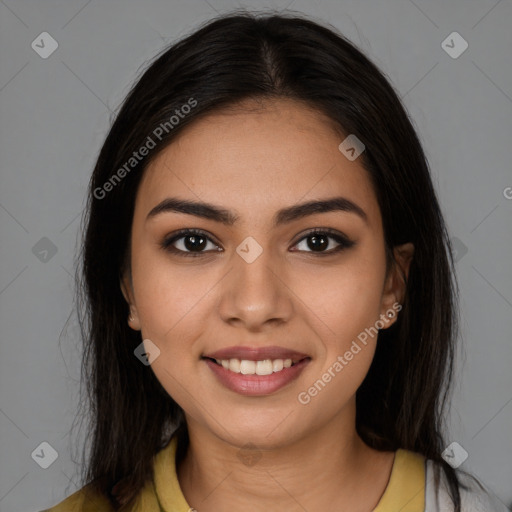 Joyful latino young-adult female with long  brown hair and brown eyes