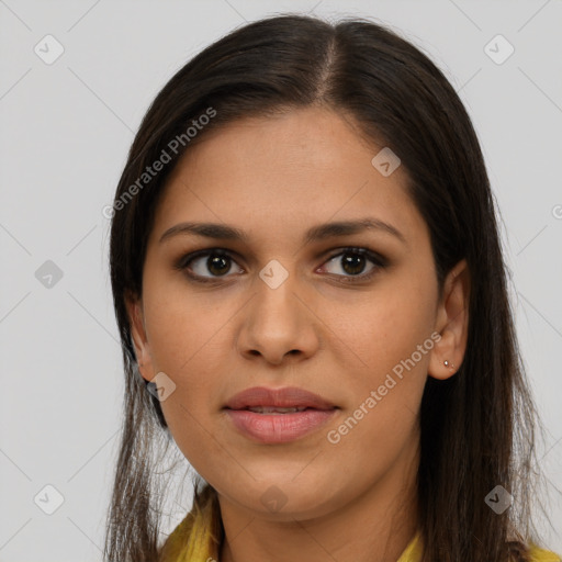 Joyful latino young-adult female with long  brown hair and brown eyes