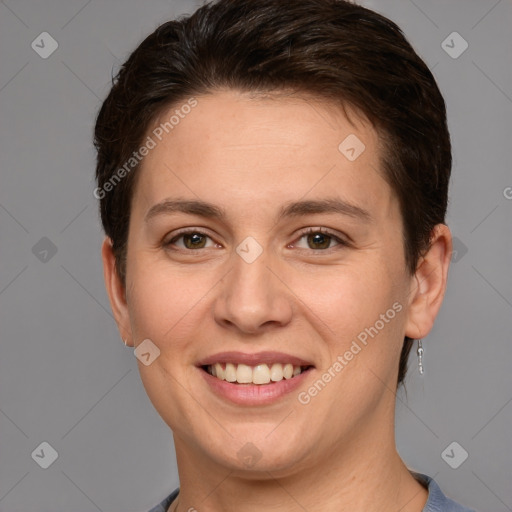 Joyful white young-adult female with short  brown hair and grey eyes