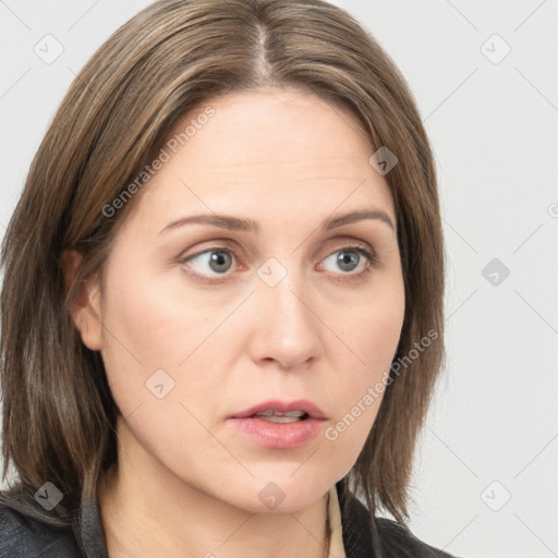 Neutral white young-adult female with medium  brown hair and grey eyes